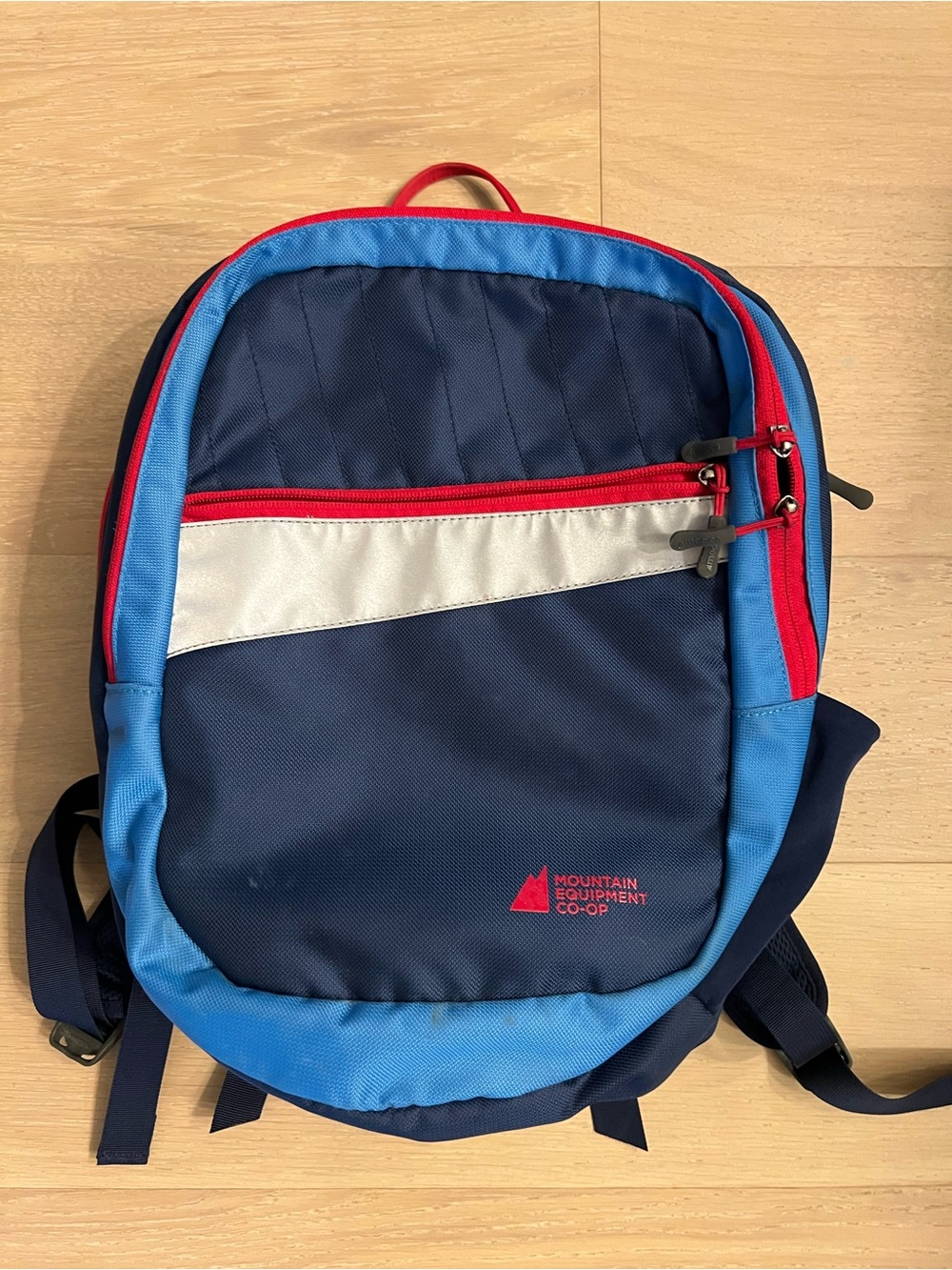 MEC navy, light blue and red daypack with silver accent